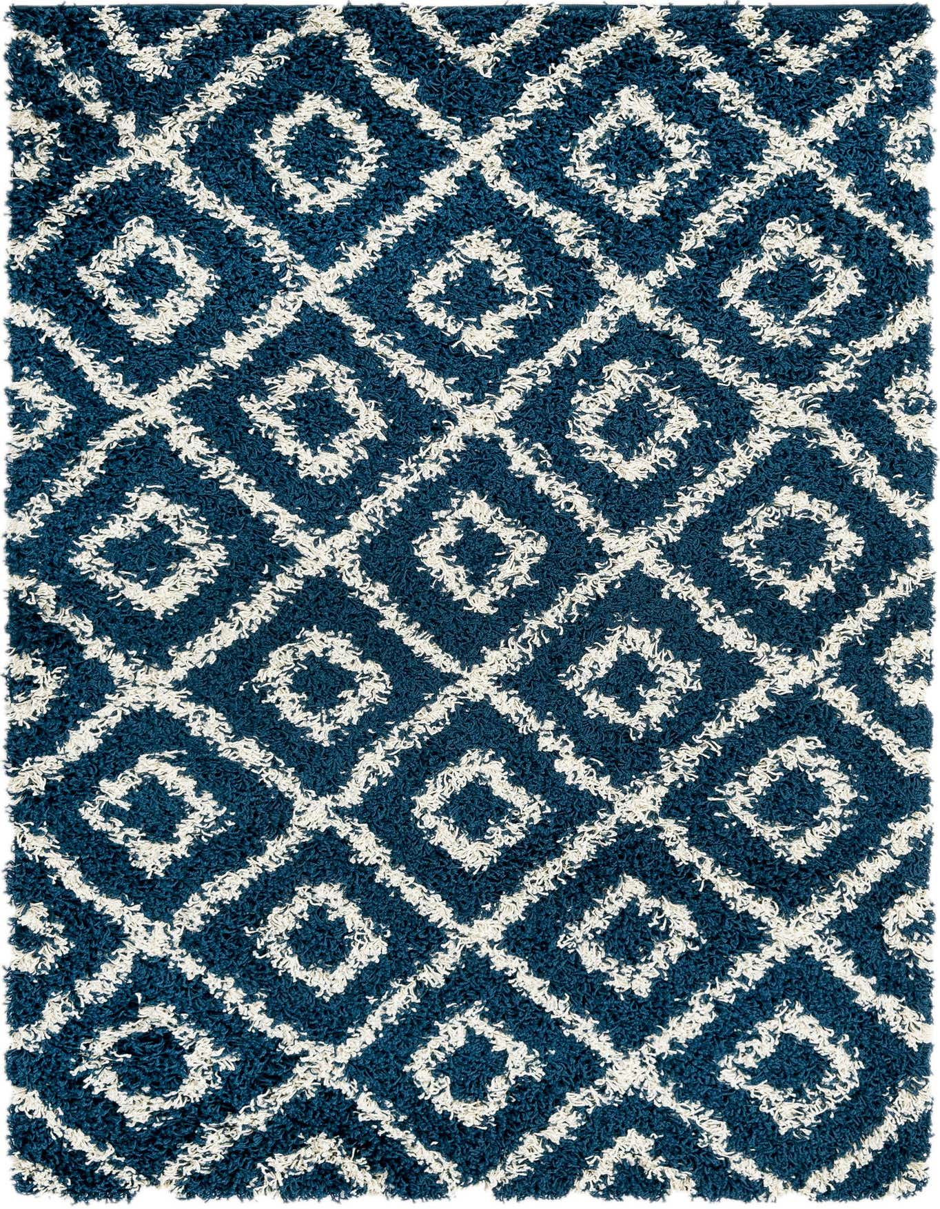 A 4x6 rectangular navy blue shag rug with a white modern lattice pattern, featuring a textured high/low pile.