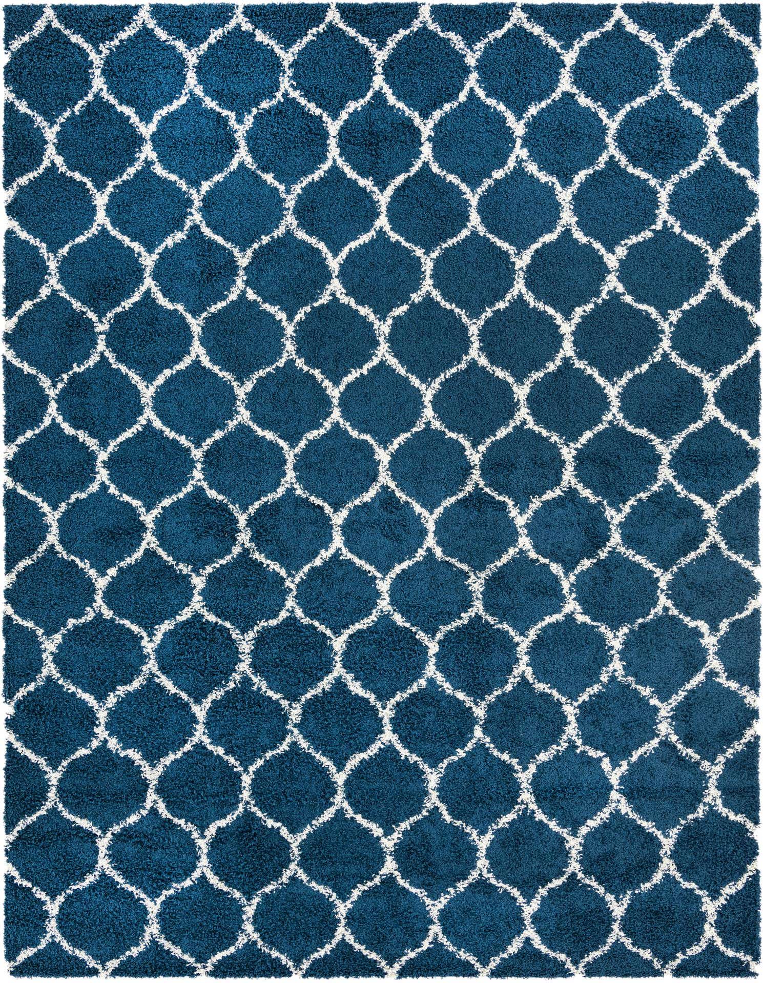 A 10x13 rectangular navy blue shag rug with a white modern lattice pattern, ideal for a living room.