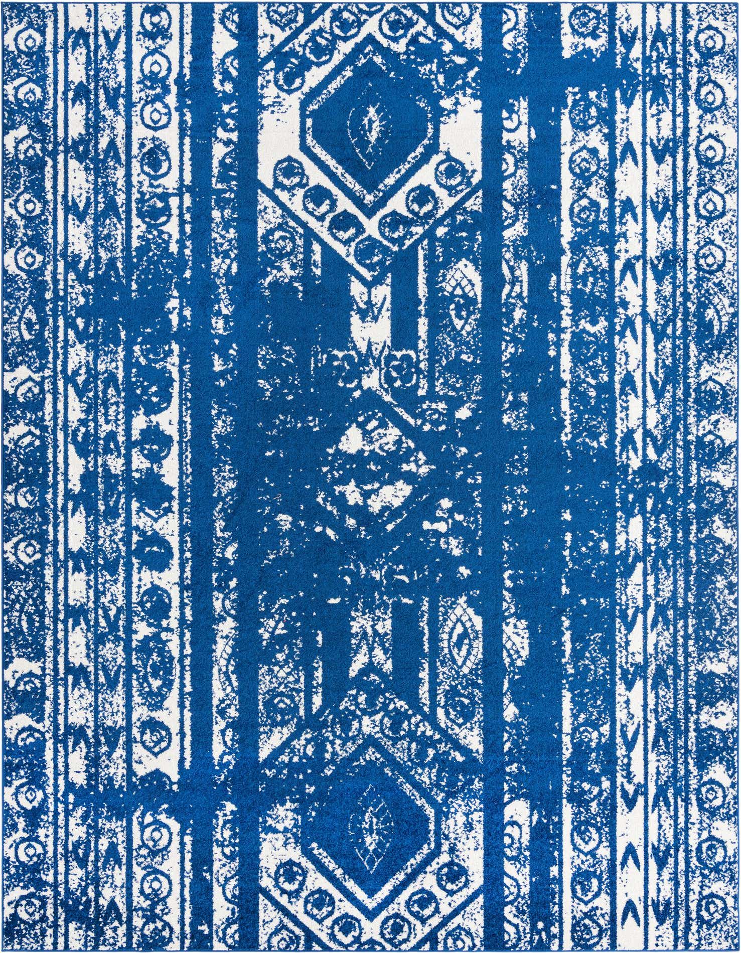 A 10x13 rectangular blue and white Southwestern rug featuring tribal patterns and stripes, ideal for a living room.