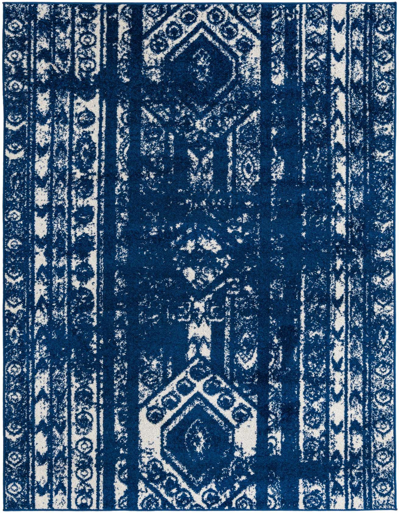 A 5x8 rectangular navy blue and white Southwestern-style rug with a distressed tribal pattern, ideal for a living room.