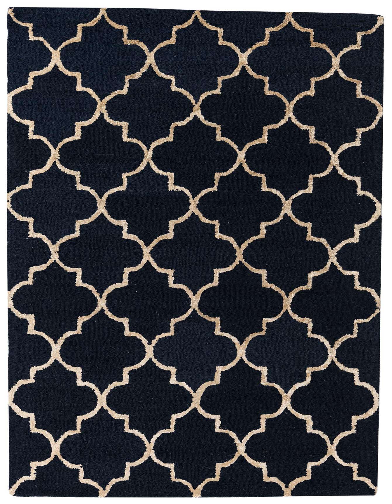 A 5x8 rectangular navy blue modern area rug with a high pile and a repeating tan quatrefoil pattern.