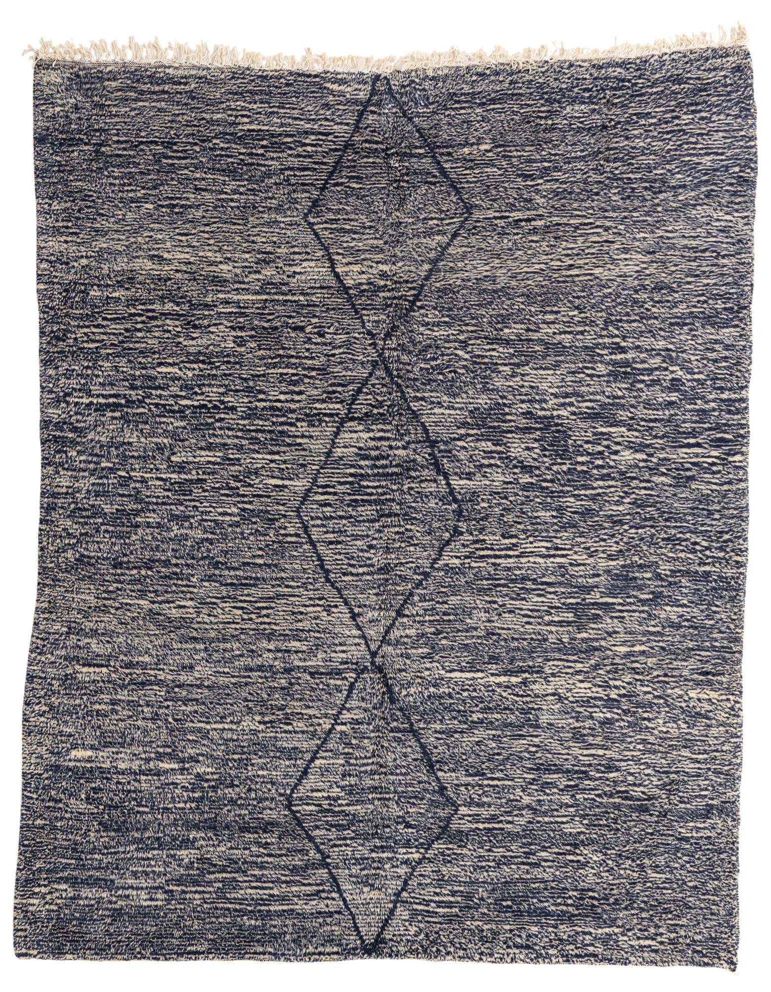 A 7x10 rectangular navy blue and cream shag rug with three large tribal diamond patterns down the center.