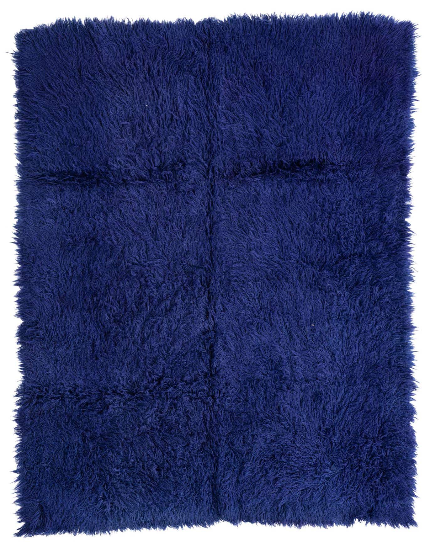 A plush 6x9 rectangular navy blue shag rug with a soft texture, ideal for a modern living room.