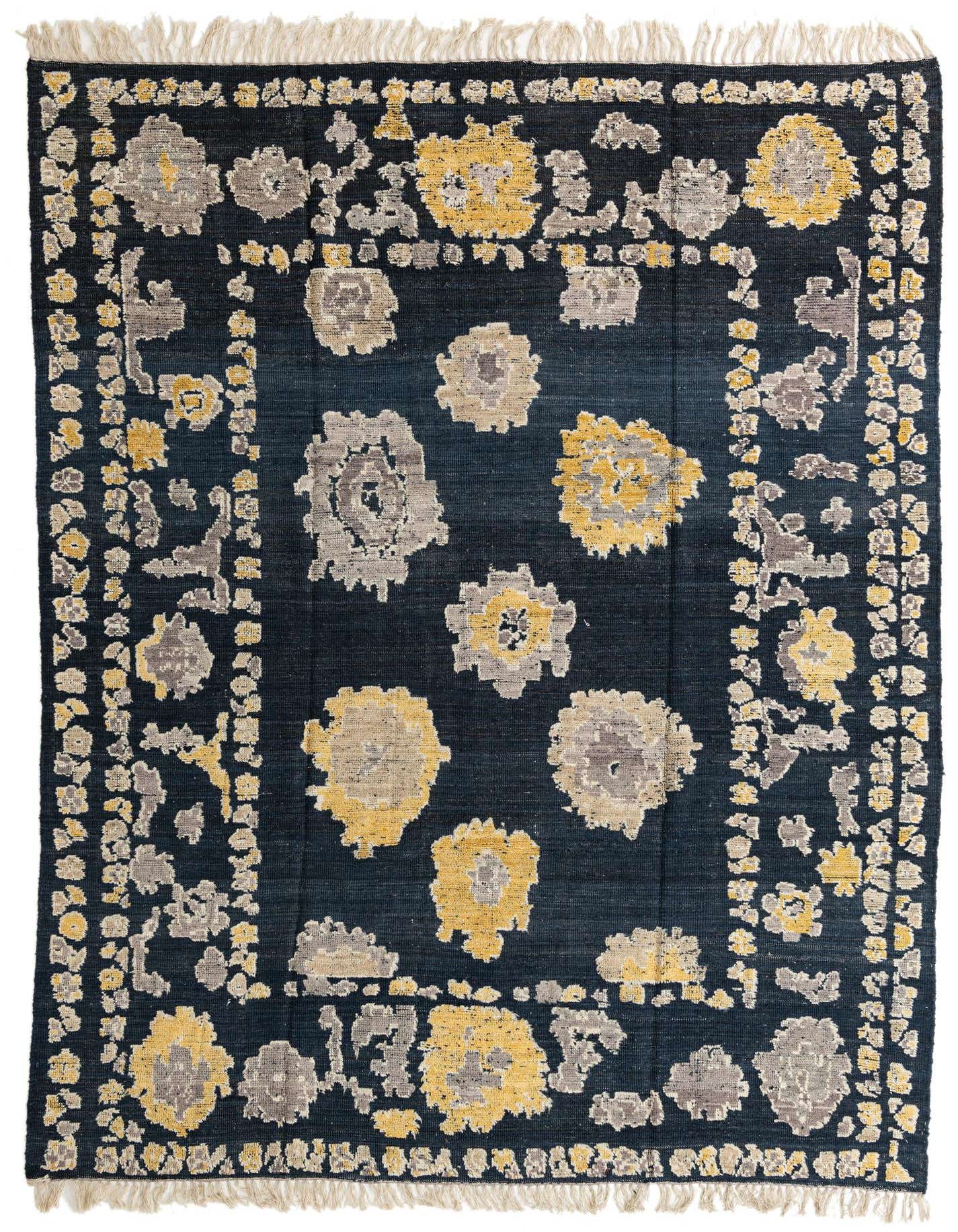 A 9x12 rectangular Oushak rug with a modern floral pattern in navy blue, yellow, and grey, featuring fringe.