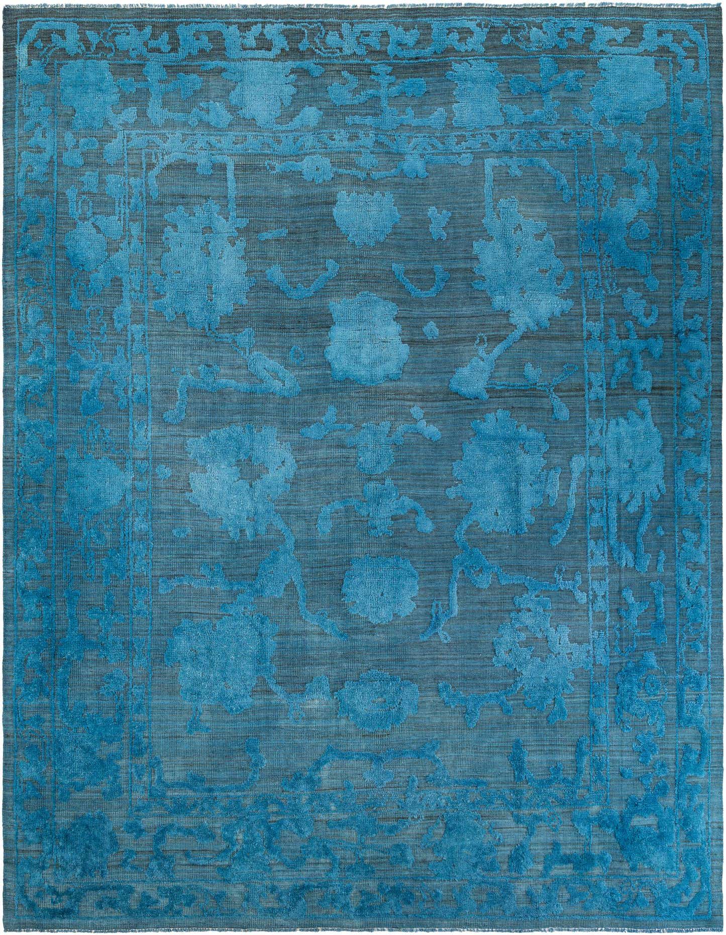 A 9x12 rectangular Oushak rug in varying shades of blue, featuring a modern floral pattern with a medium pile.