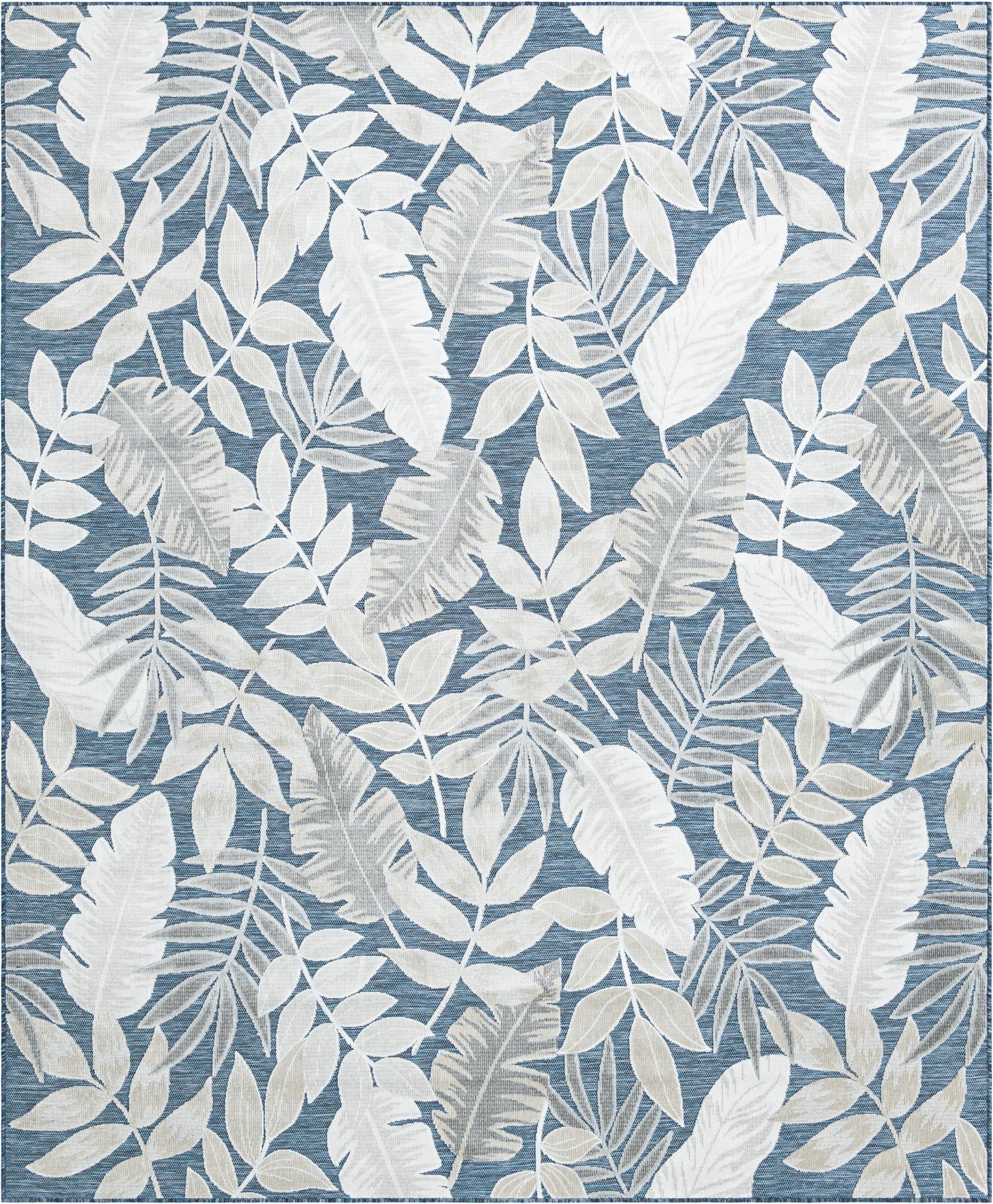 An 8x10 rectangular rug with a tropical leaf pattern in shades of white, beige, and gray on a blue background.