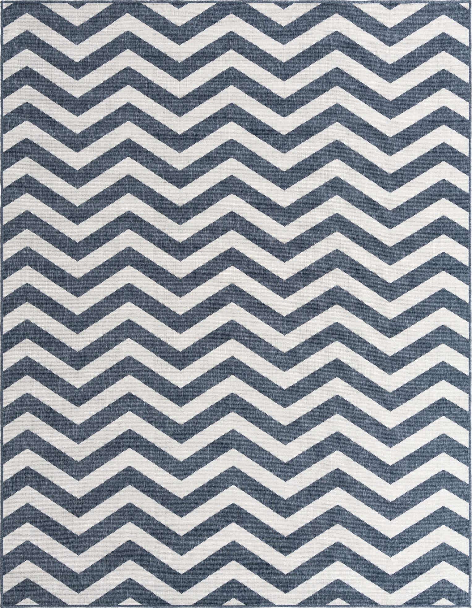 An 8x10 rectangular indoor/outdoor rug featuring a bold navy blue and white chevron pattern, suitable for a living room or patio.