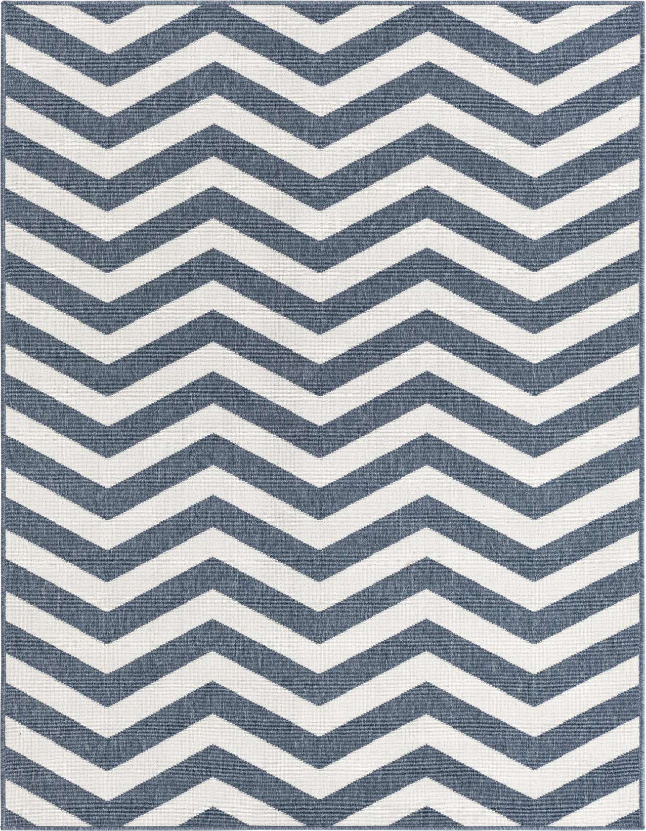 A 5x8 rectangular indoor/outdoor rug featuring a bold navy blue and white chevron pattern, suitable for a living room or patio.