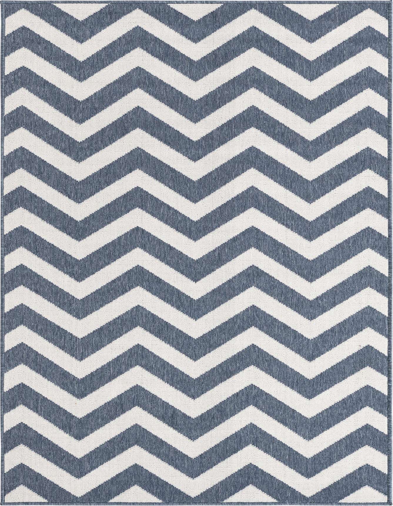 A 4x6 rectangular indoor/outdoor rug featuring a bold navy blue and white chevron pattern, ideal for a patio or living room.