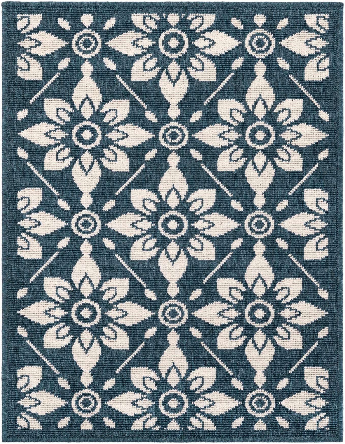 A 2x3 rectangular Rugs.com Outdoor Lattice rug featuring a repeating modern floral pattern in navy blue and cream.