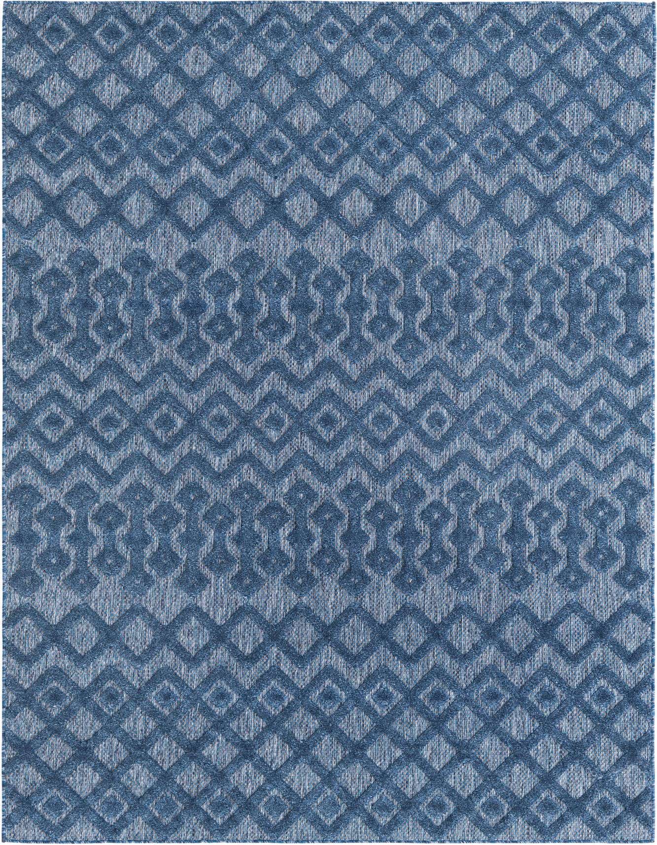 A 6x9 rectangular navy blue indoor/outdoor rug with a high/low textured tribal trellis pattern.