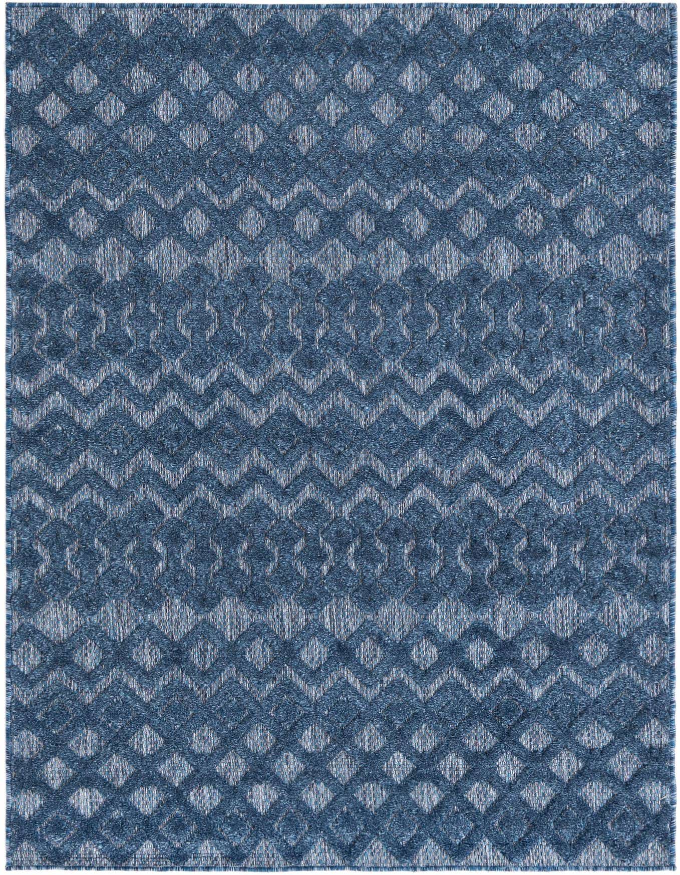 A 4x6 rectangular navy blue indoor/outdoor rug with a textured tribal trellis pattern.