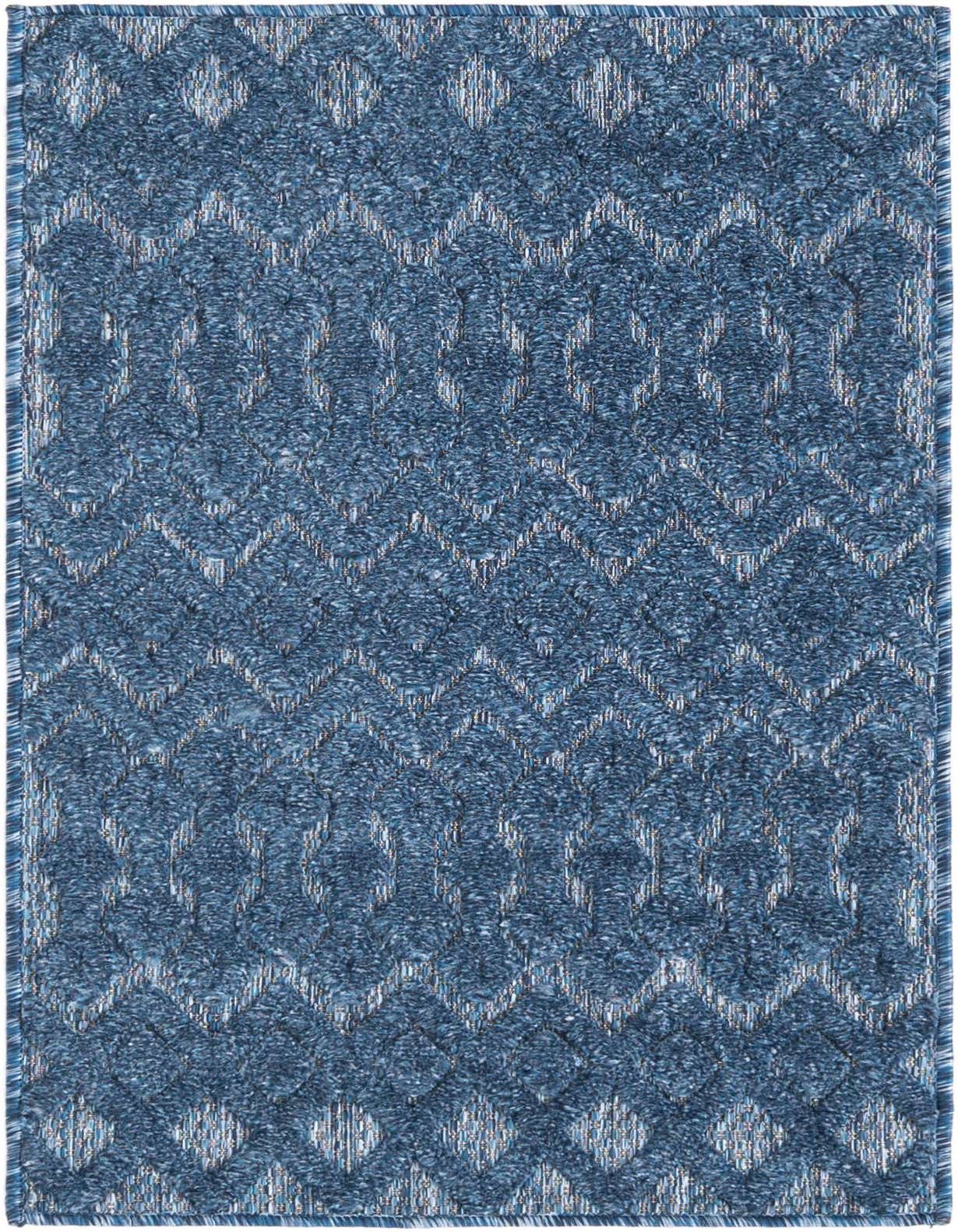 A 2x3 rectangular navy blue indoor/outdoor rug with a textured tribal trellis pattern and high-low pile.