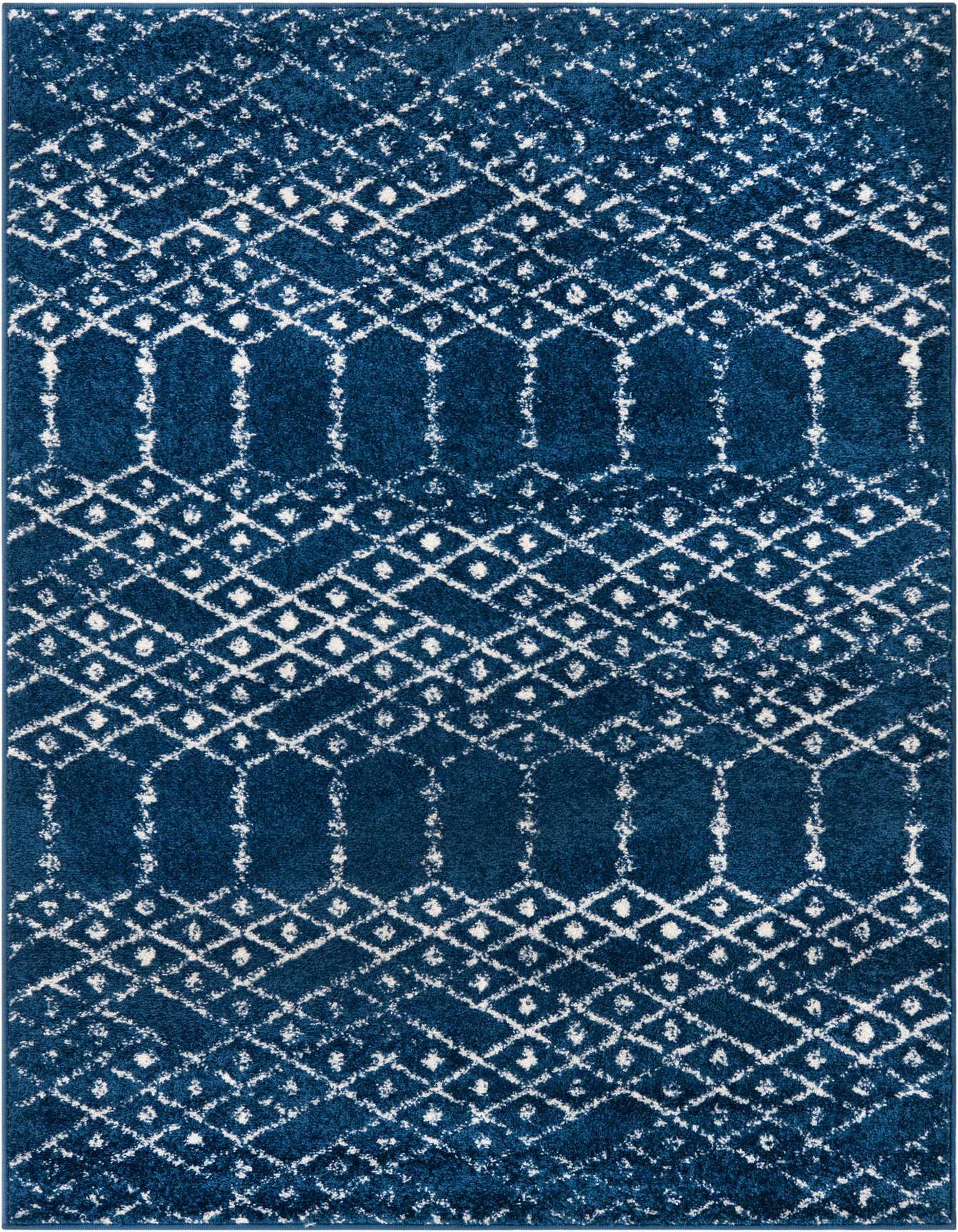 A 4x6 rectangular Paxon Trellis rug in deep navy blue with a distressed white tribal trellis pattern.