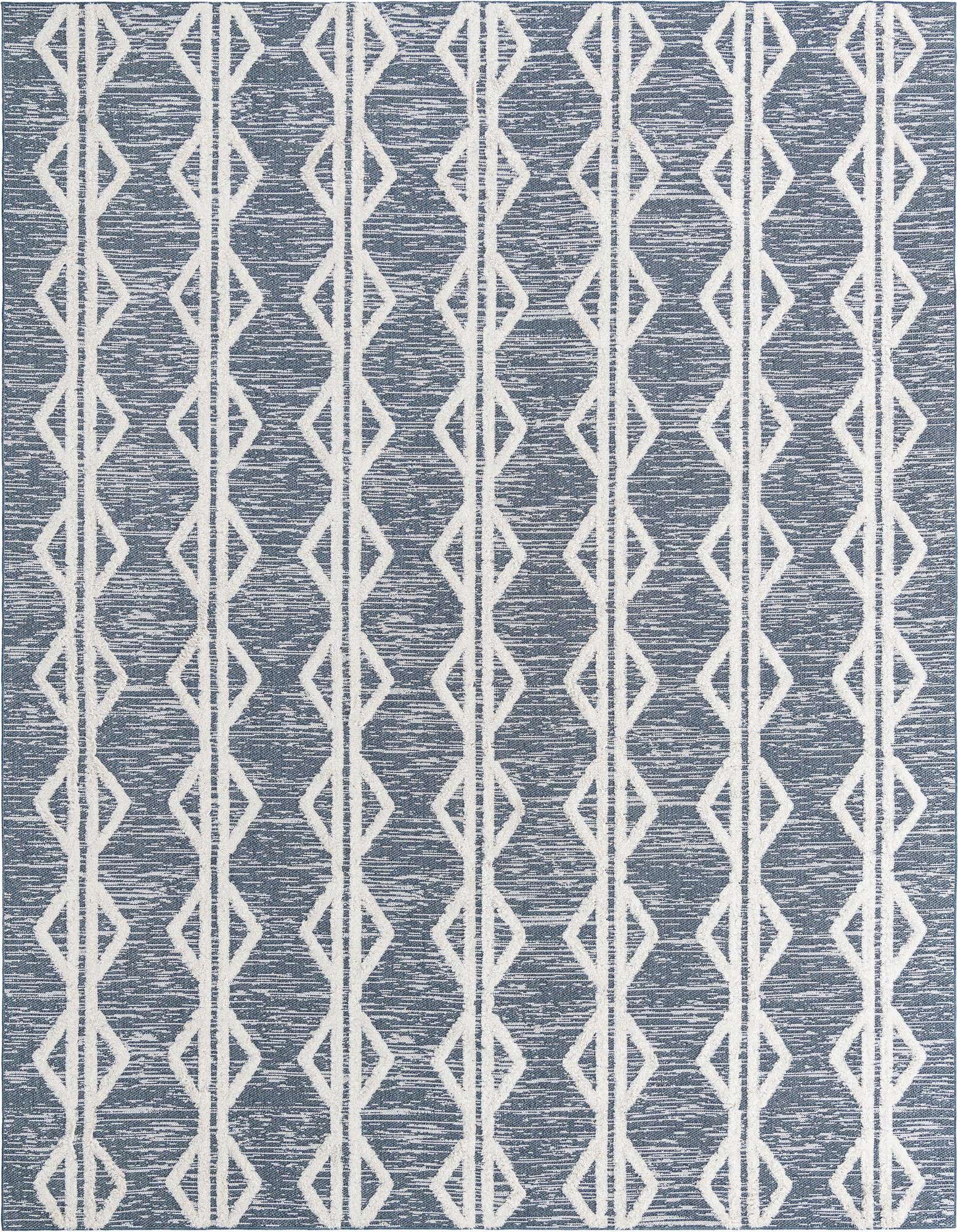 A 9x12 rectangular navy blue cotton rug with a modern tribal stripe pattern of white textured diamonds.