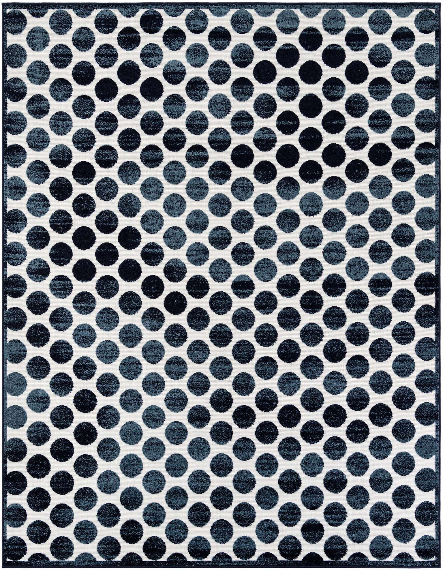 An 8x10 rectangular indoor/outdoor rug featuring a modern abstract pattern of varying navy blue polka dots on a white background.