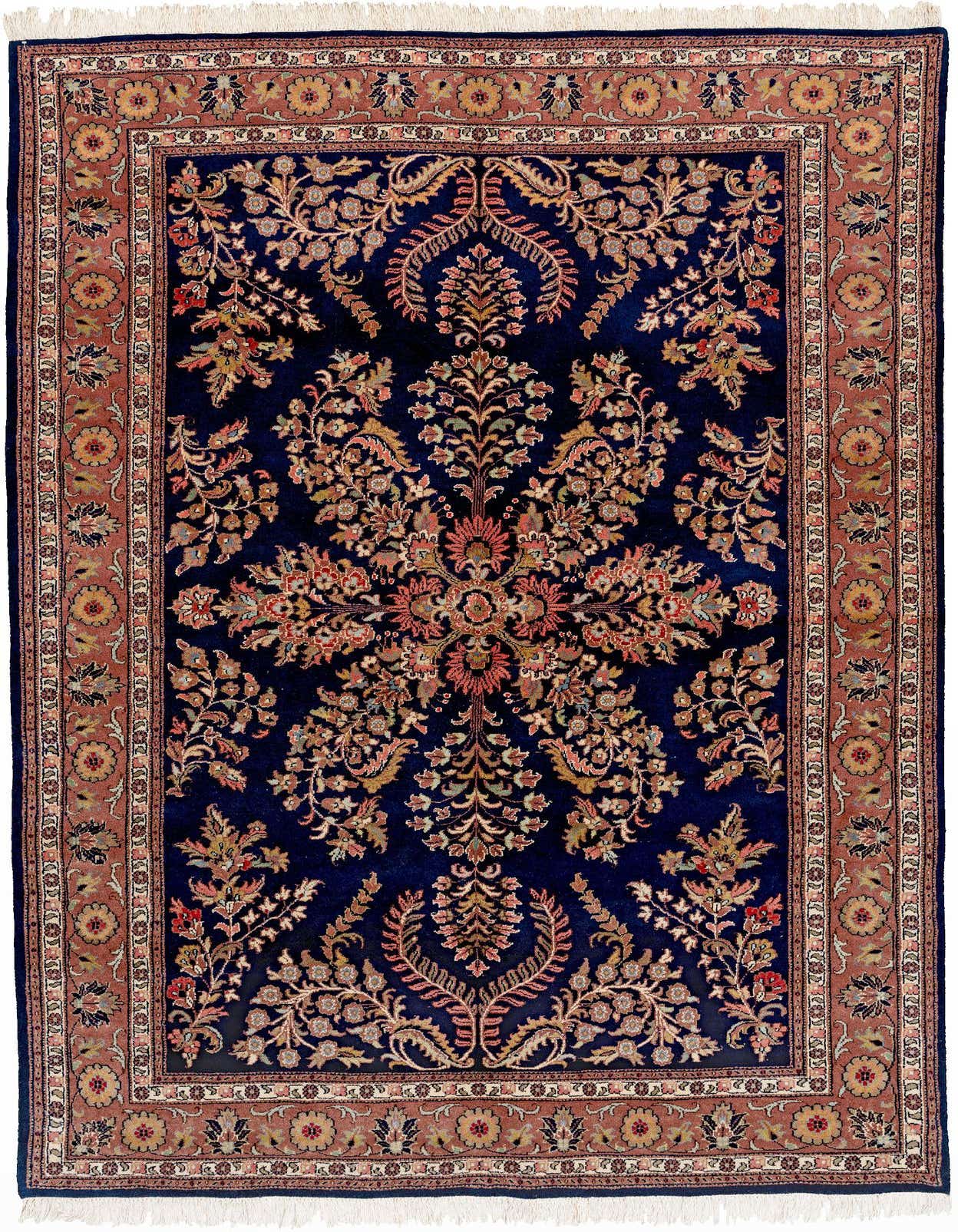 A 5x8 rectangular navy blue traditional Sarough rug with an intricate floral medallion pattern and a rust-colored border.