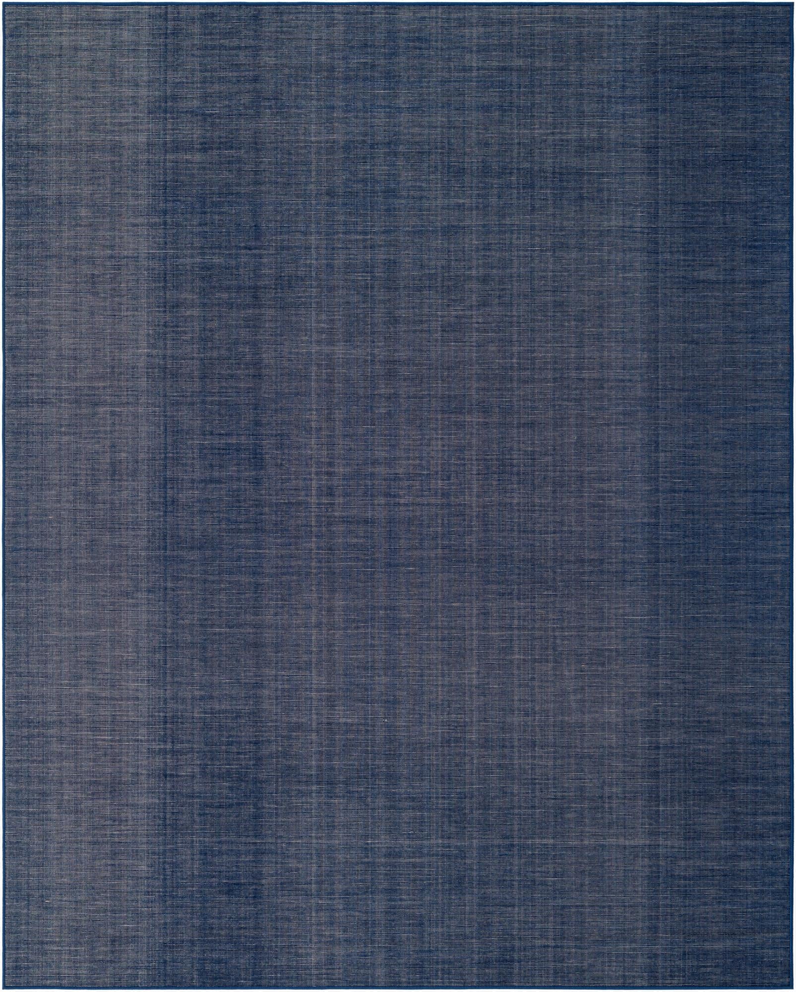 A rectangular 8x10 navy blue flatweave rug with a subtle textured, solid pattern, ideal for a living room.