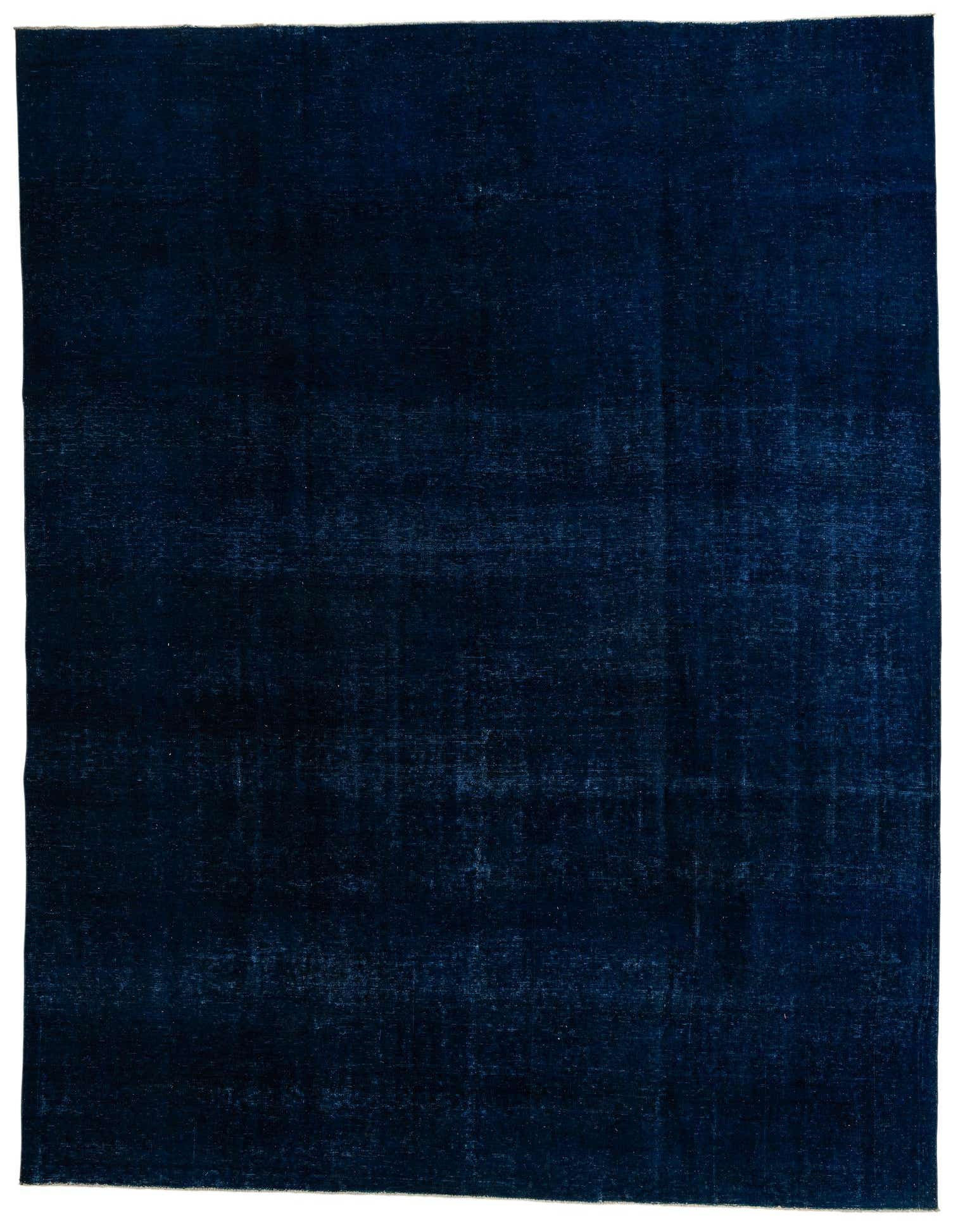 A large 10x13 rectangular navy blue wool area rug with a subtle, distressed vintage Persian pattern.