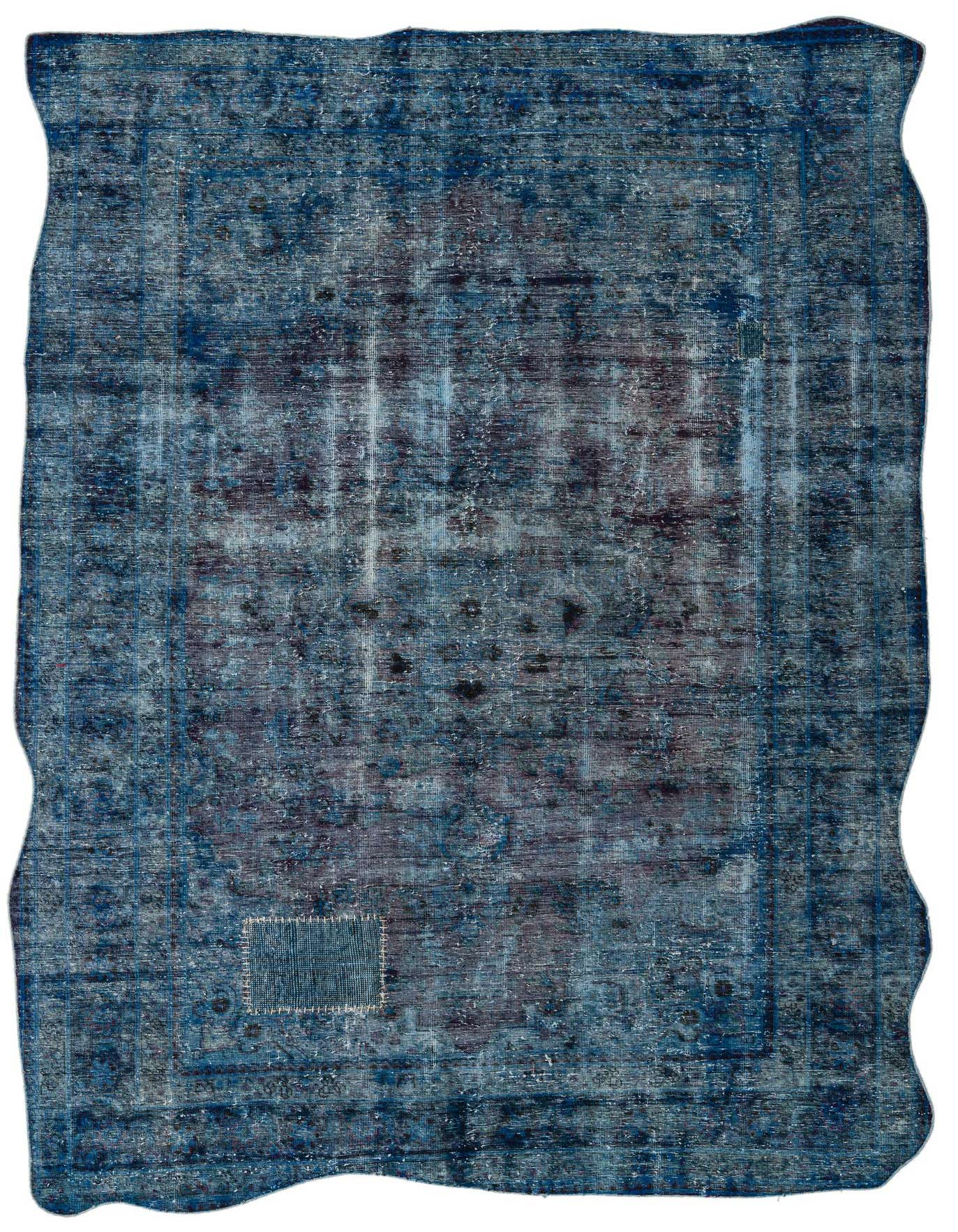 A 6x9 rectangular Rugs.com Ultra Vintage rug in distressed blues with a subtle Persian pattern and a visible patch.