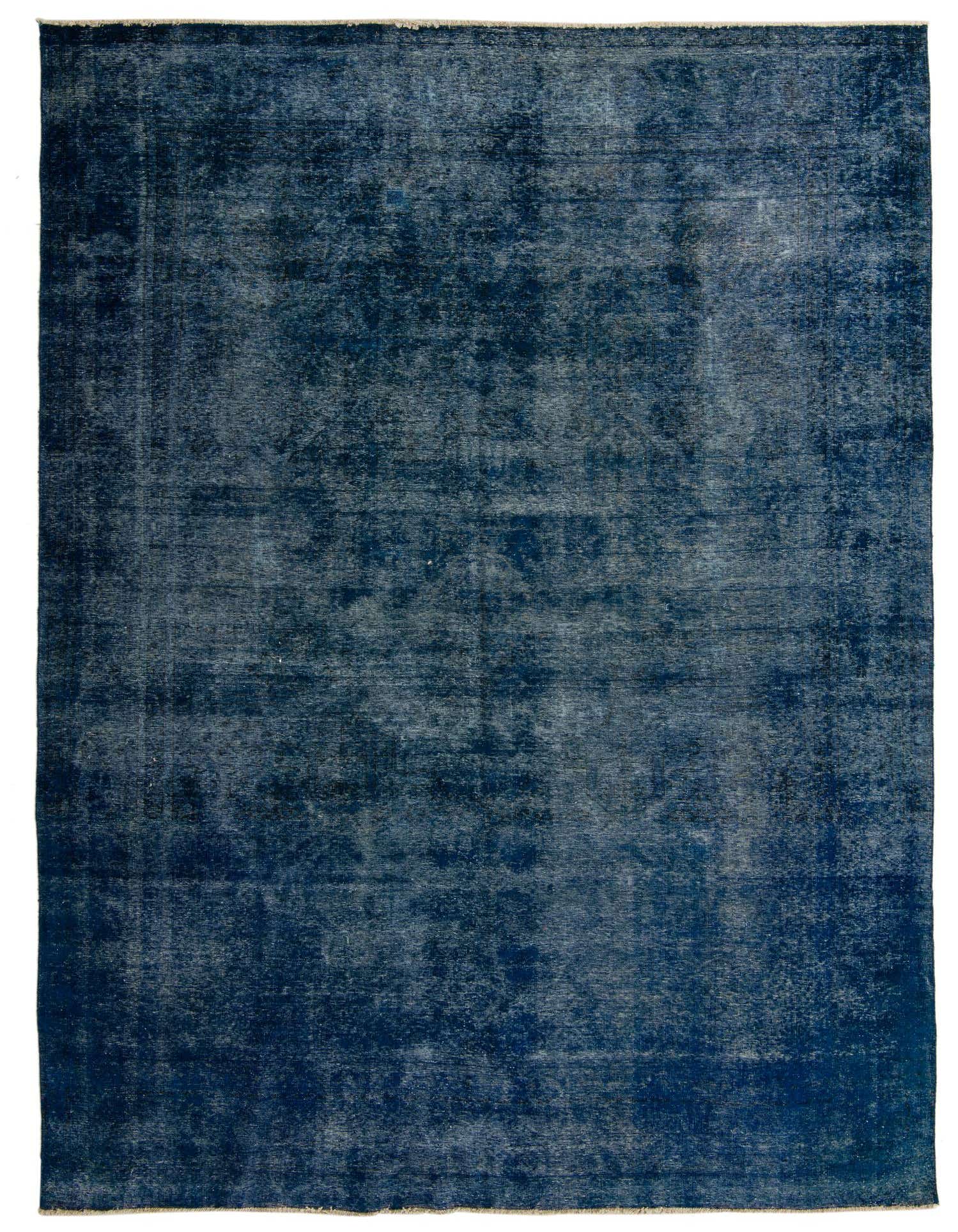 A large 9x12 rectangular Ultra Vintage rug in varying shades of deep navy blue with a distressed, abstract Persian pattern.