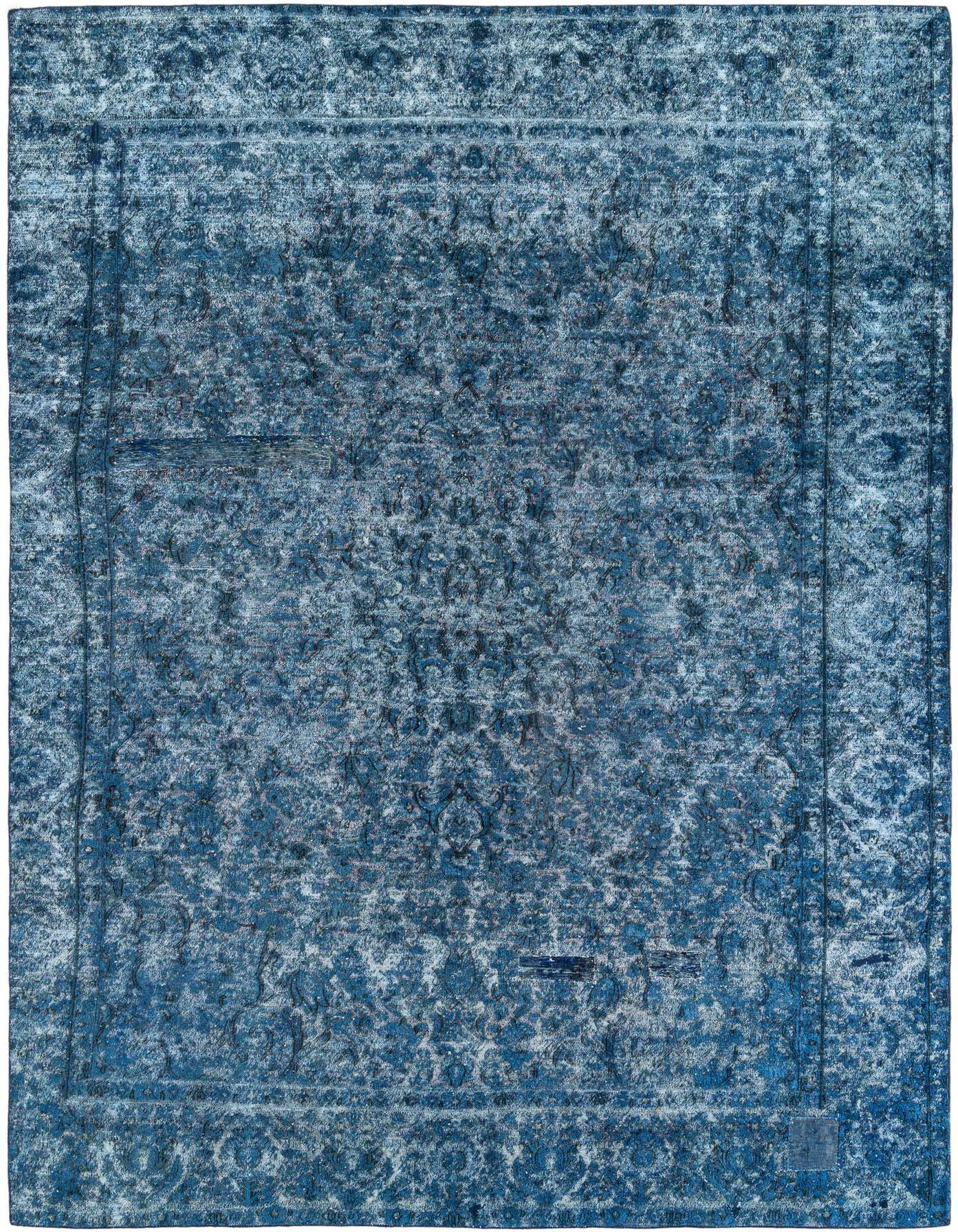 Rectangular 8x11 Ultra Vintage rug in varying shades of blue with a distressed Persian medallion pattern, suitable for a living room.