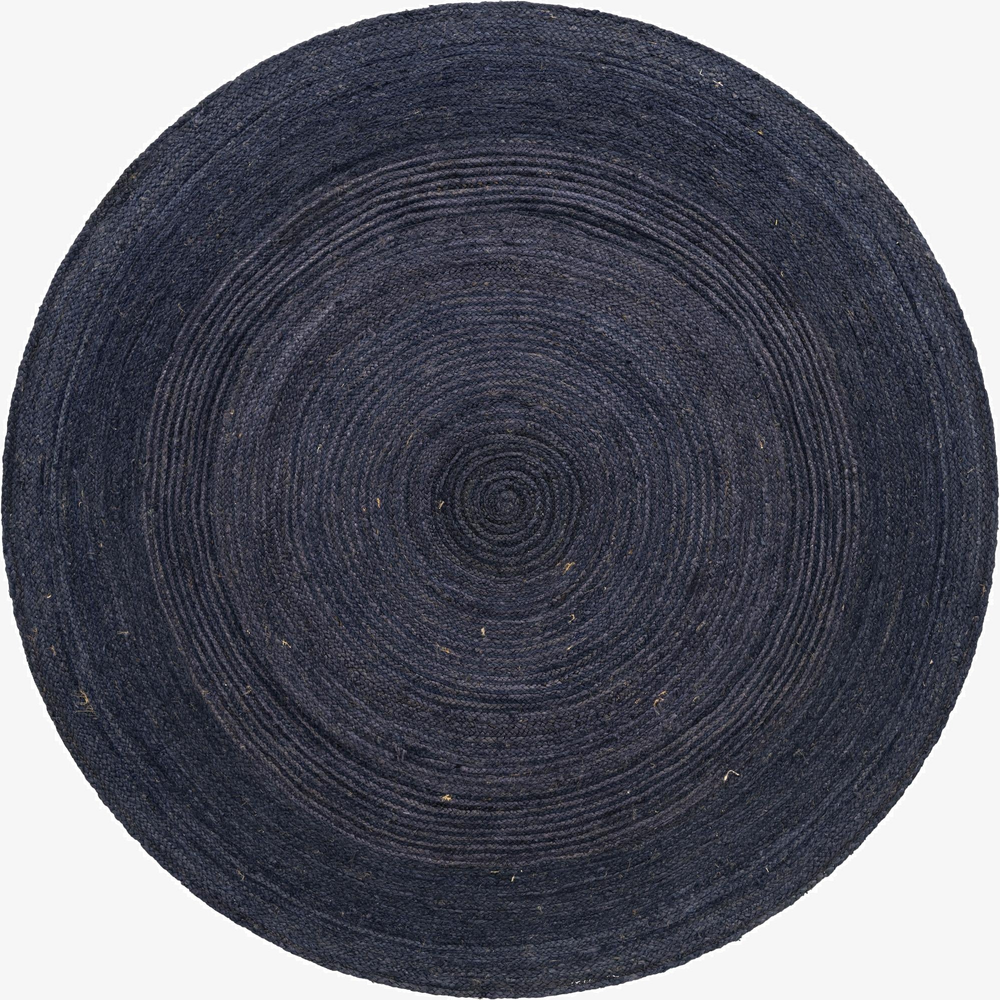 A dark navy blue round jute rug with a braided, textured flatweave pattern, perfect for a living room or bedroom.