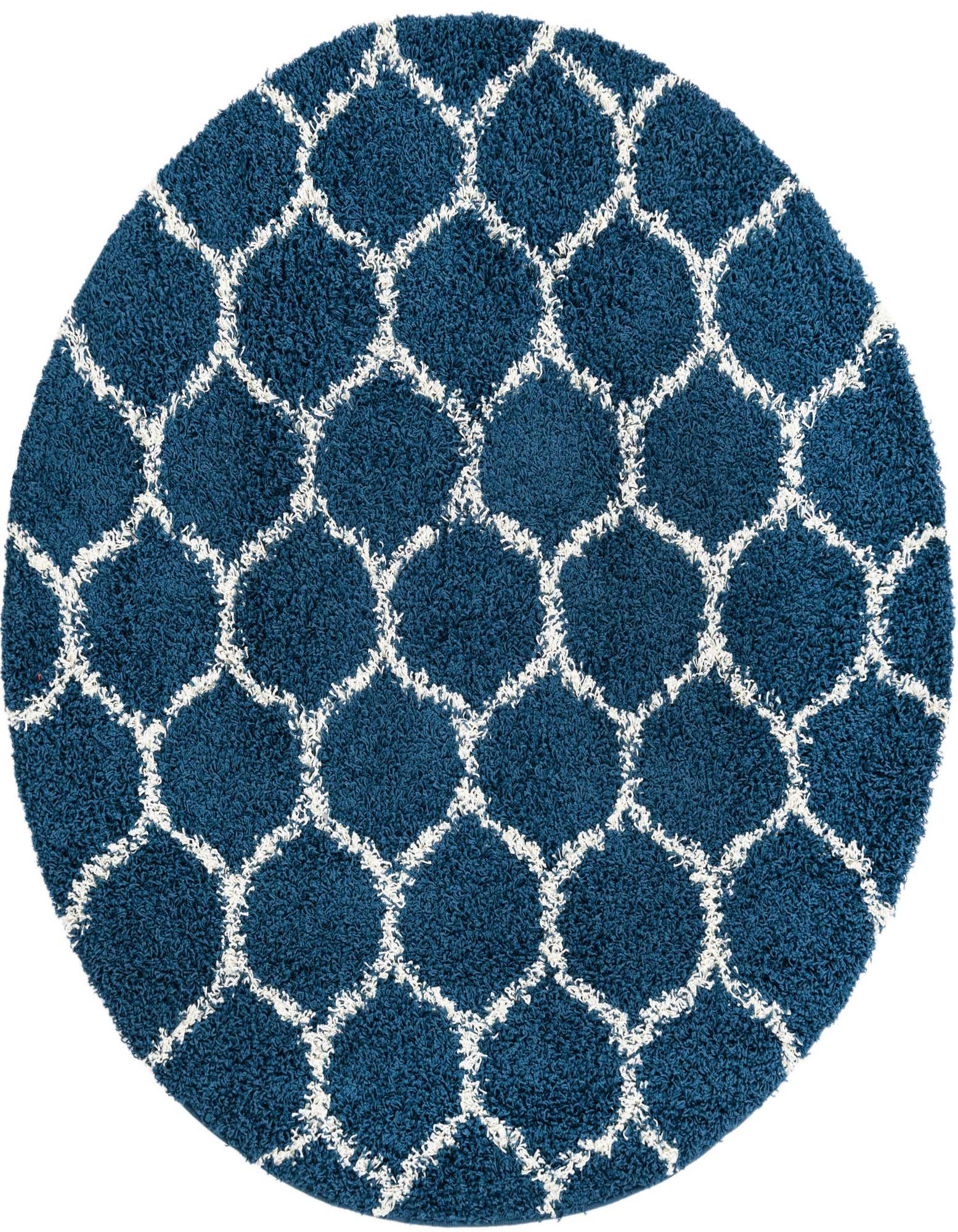 A round 6' 0 x 6' 0 navy blue shag rug with a white modern lattice pattern, showcasing its textured high-low pile.