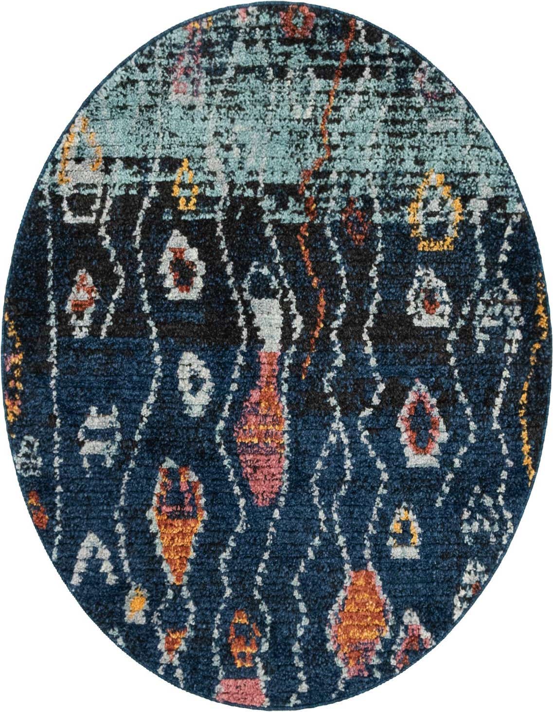 A 4' round navy blue shag rug with a bohemian, tribal pattern featuring abstract shapes in light blue, orange, pink, and white.