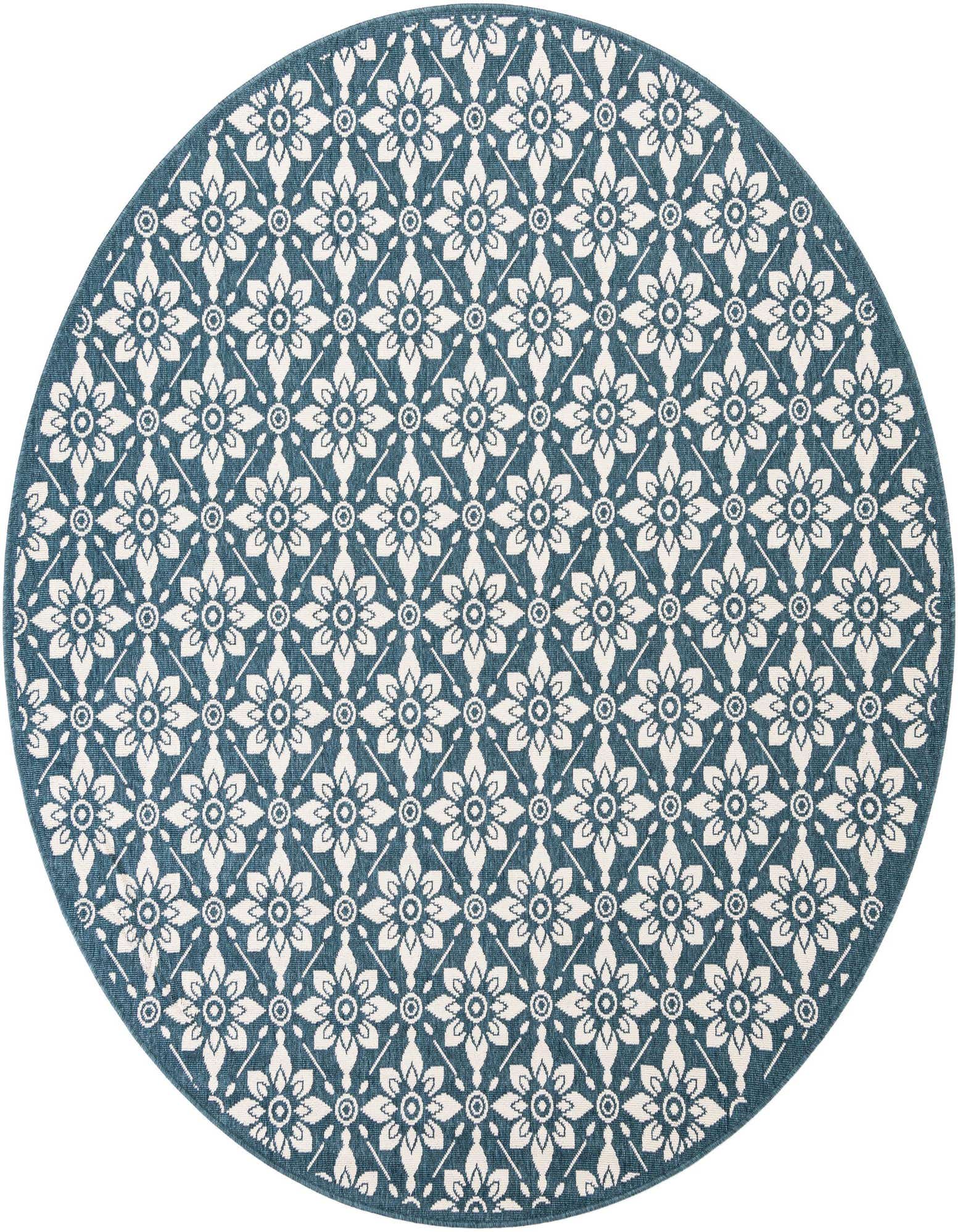 A 7' 10 round navy blue and white floral outdoor rug with a modern lattice pattern.