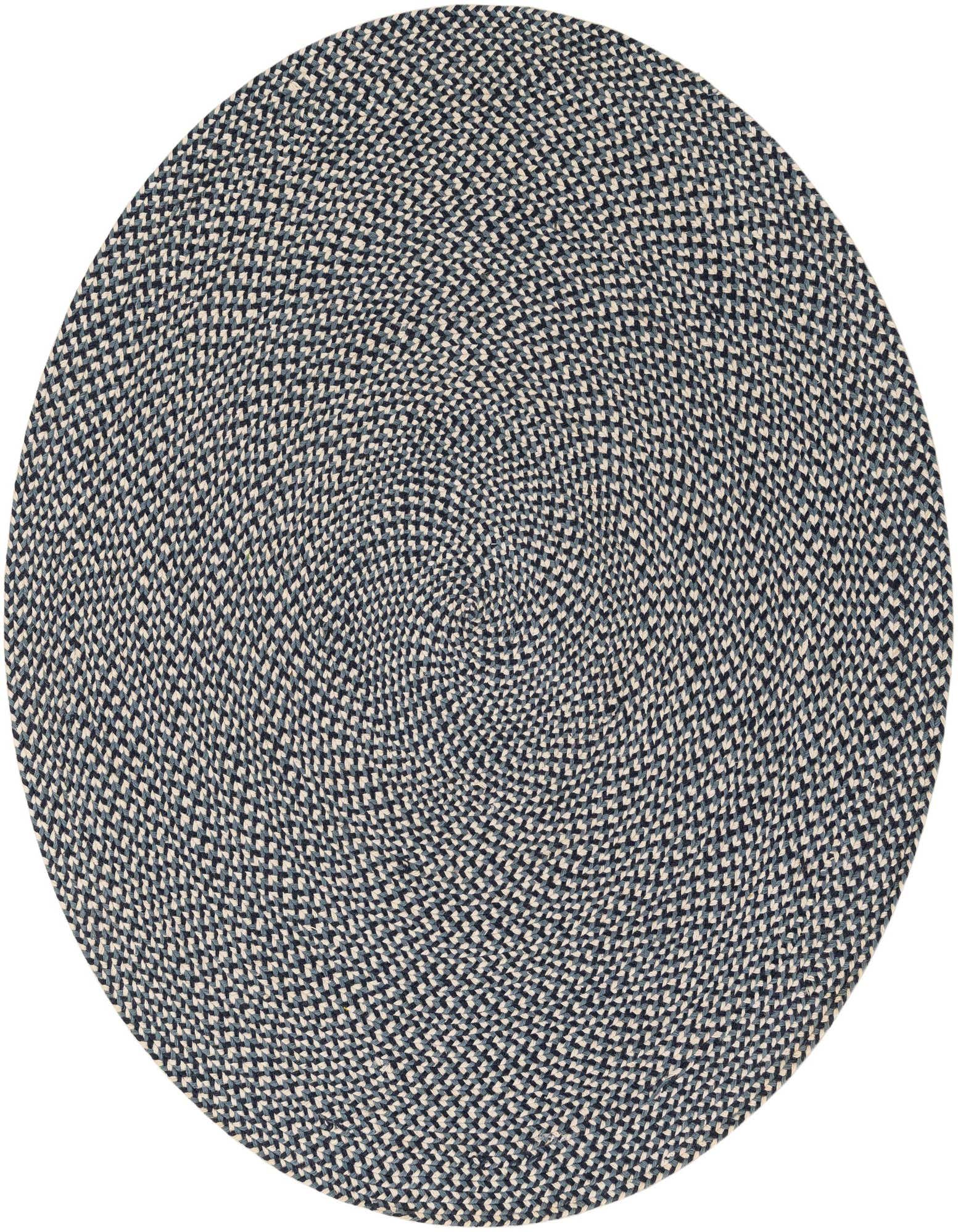 A 5' 1 round navy blue and off-white braided jute rug, handmade with a textured medium pile, suitable for indoor spaces.