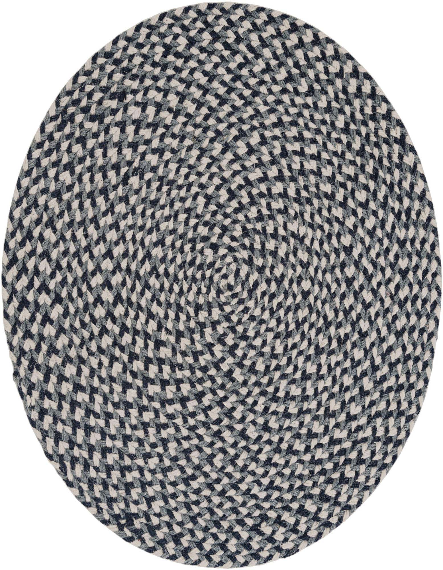 A 2' round braided jute rug in varying shades of blue, perfect for an indoor patio.