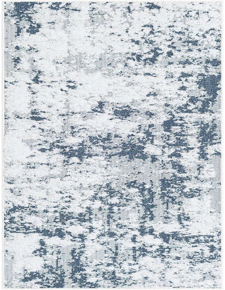 A 6 ft runner rug with an abstract pattern in varying shades of blue and white, featuring a textured, high-low pile.