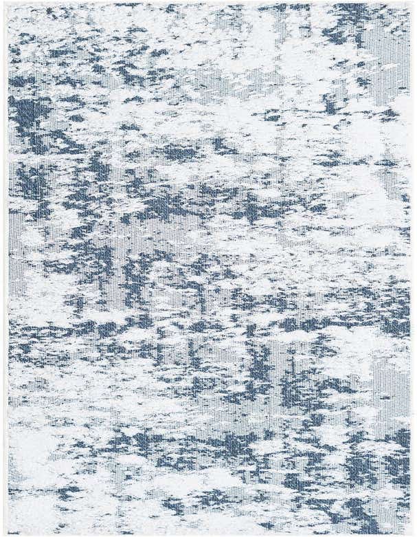 A navy blue and white abstract runner rug with a textured, high-pile pattern, ideal for a hallway or kitchen.