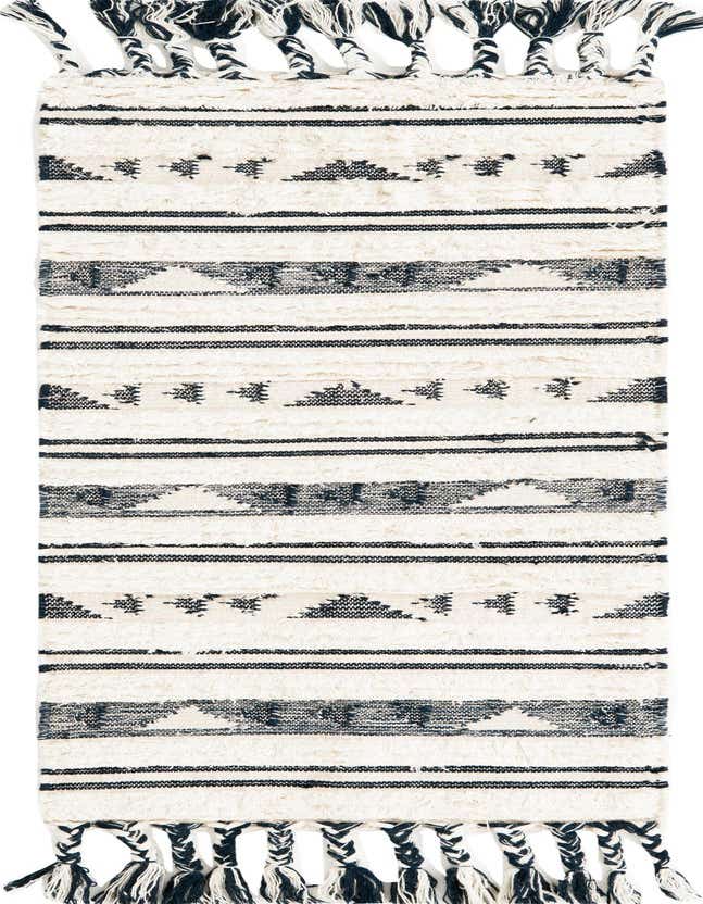 A 6 ft runner rug from the Arizona Collection, featuring a tribal and modern bohemian stripe pattern in navy blue and off-white with shag pile and braided tassels.