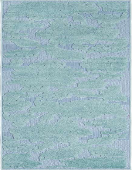A 10 ft runner rug featuring a modern botanical pattern in varying shades of blue, ideal for a hallway or patio.