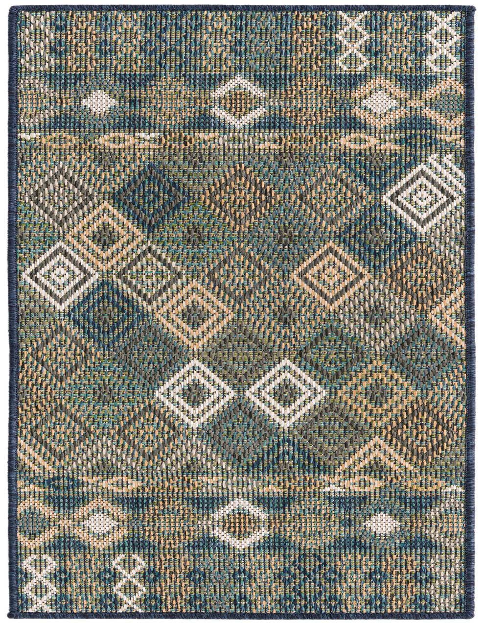 A 4 ft runner rug from the Baja Outdoor collection featuring a modern trellis pattern in shades of blue, teal, and beige.