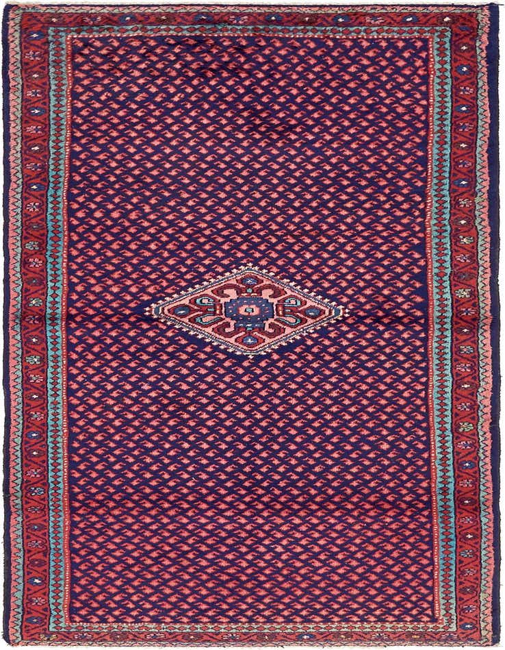 A 10 ft Botemir runner rug in navy blue and red, featuring a traditional tribal medallion pattern and intricate border.
