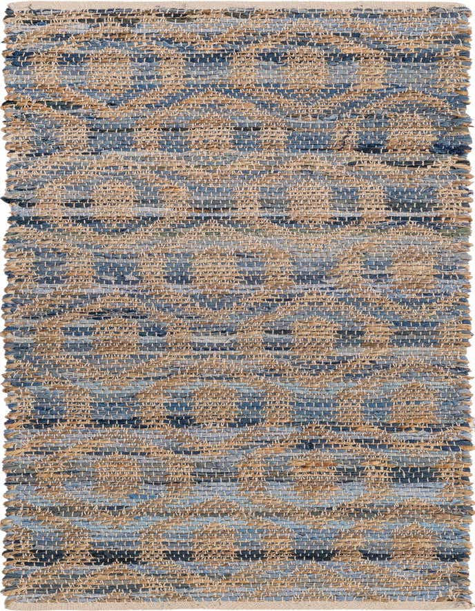 A 6 ft runner rug with a textured flatweave in alternating stripes of natural jute and various shades of blue denim, featuring a subtle trellis pattern.