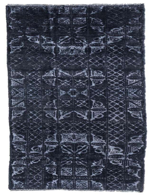 A handmade 8 ft runner rug from the Darya collection featuring an abstract pattern in varying shades of blue, ideal for a hallway.