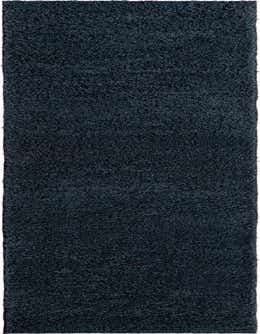 A long, plush navy blue shag runner rug with a textured pile, perfect for a hallway.