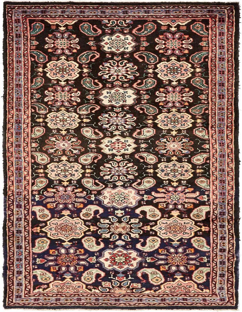 A 10 Ft Farahan runner rug with a navy blue background and intricate traditional Persian floral and paisley patterns in pink, cream, and green.