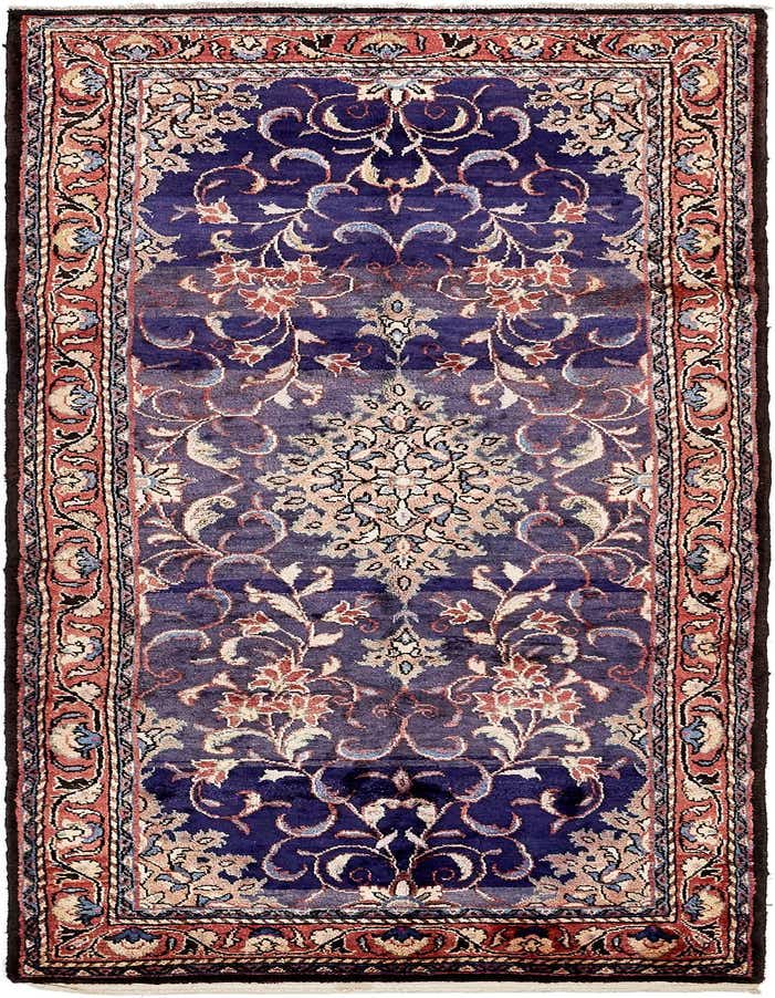 A 10 Ft Farahan runner rug featuring a deep navy blue field with intricate traditional Persian medallion and floral patterns in red, beige, and light blue, framed by a detailed border.