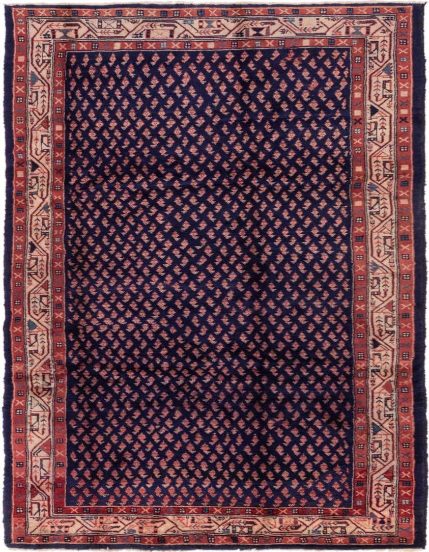A 10 Ft Farahan runner rug featuring a deep navy blue field with a repeating small red leaf pattern, framed by a traditional Persian border in red and beige.