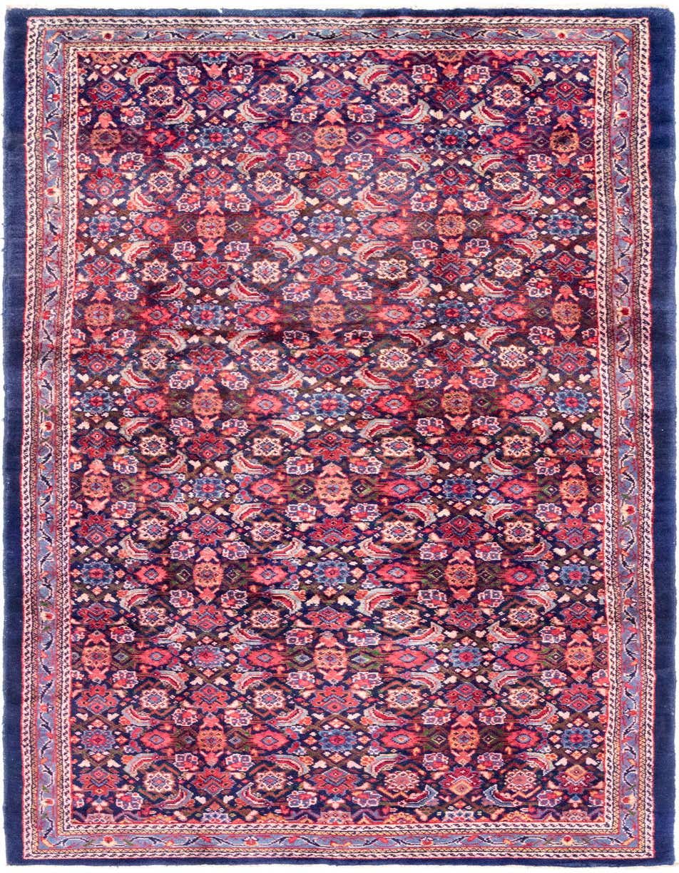 A 10 Ft Farahan runner rug featuring a detailed traditional Persian pattern in shades of blue, red, and cream.