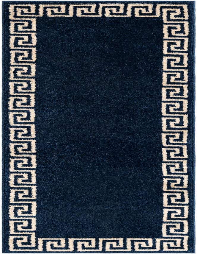 A navy blue runner rug with a cream Greek key border, perfect for a hallway or kitchen.