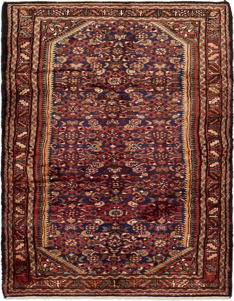 A handmade 10 Ft Hossainabad runner rug with a navy blue field and intricate tribal Persian patterns in red, brown, and cream, ideal for a hallway.