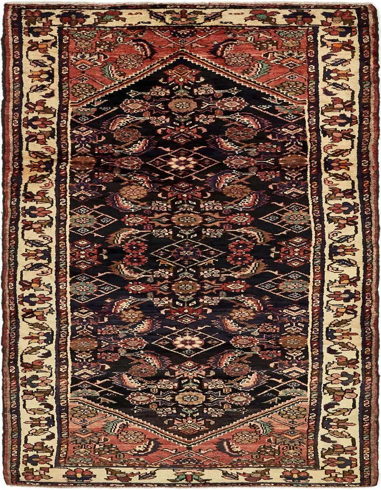 A 10 ft Hossainabad runner rug in navy blue with a tribal Persian pattern and red and cream accents, ideal for a hallway.