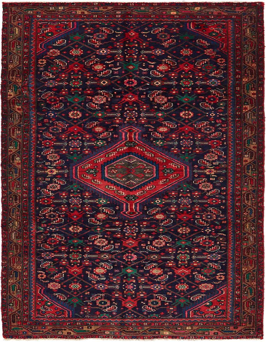 A 10 ft runner rug with a navy blue background, featuring a red medallion and intricate Persian, tribal patterns in red, green, and gold.