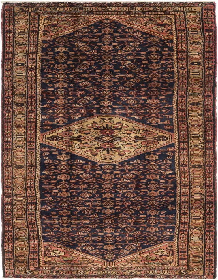 A 10 ft Hossainabad runner rug in navy blue with a traditional Persian medallion design and tribal patterns.